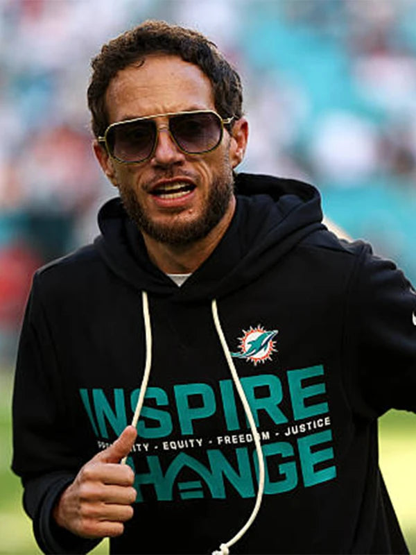 Black pullover sideline hoodie inspired by Mike McDaniel showcasing Miami Dolphins Inspire Change design