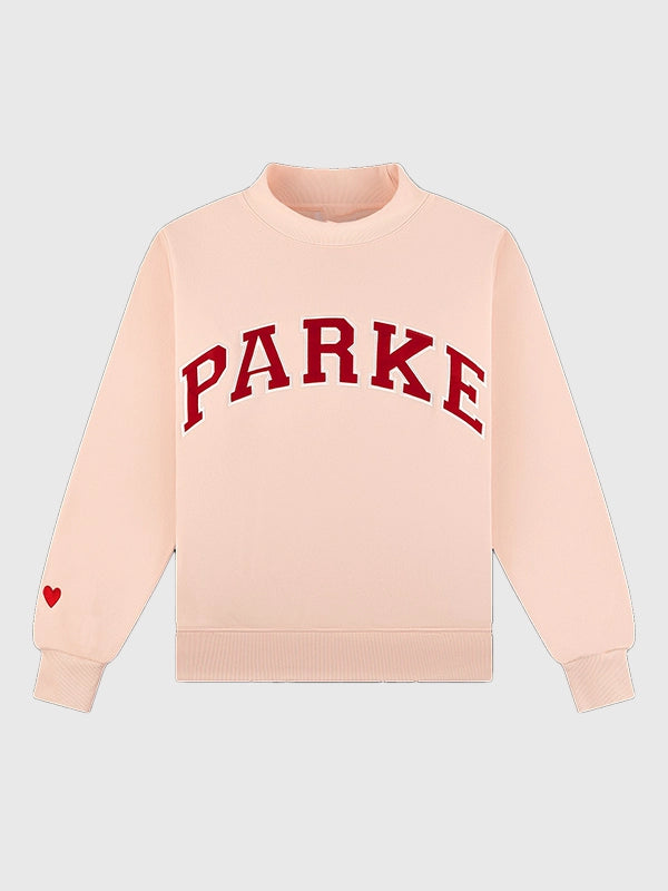 RECREATED Parke Valentine’s 2026 drop varsity mockneck fleece sweatshirt in light pink with a soft pastel tone