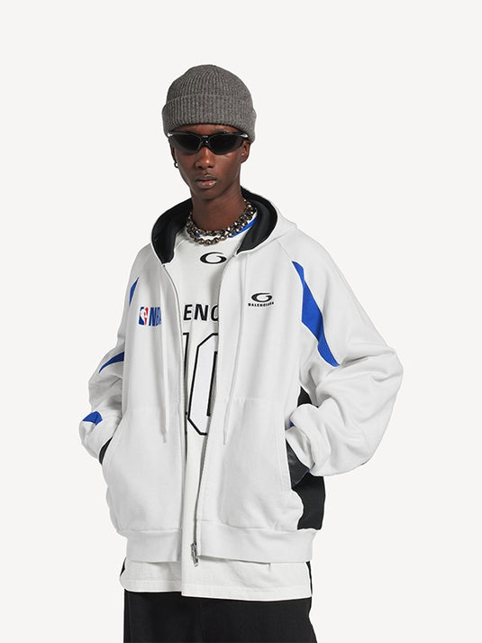 White oversized zip-up fleece hoodie from NBA x Balenciaga 2026 featuring a bold unisex silhouette and premium casual appeal