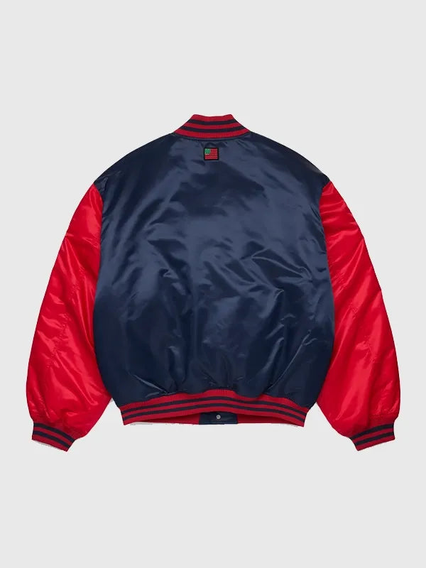 Denim Tears 2026 satin varsity jacket recreated in navy and red with sleek texture and statement outerwear appeal