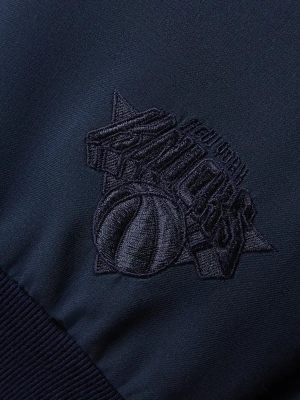 RECREATED New York Knicks 2026 Playoffs bomber jacket in navy by Giorgio Armani and Kith, featuring sleek construction and bold team-inspired design