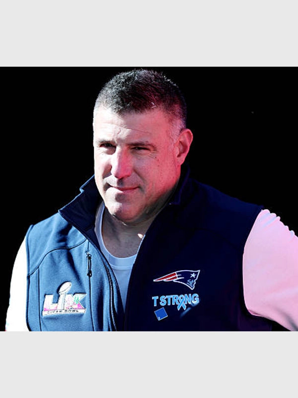 Navy fleece vest with full zipper and T Strong branding modeled after Mike Vrabel’s Super Bowl LX Patriots sideline gear