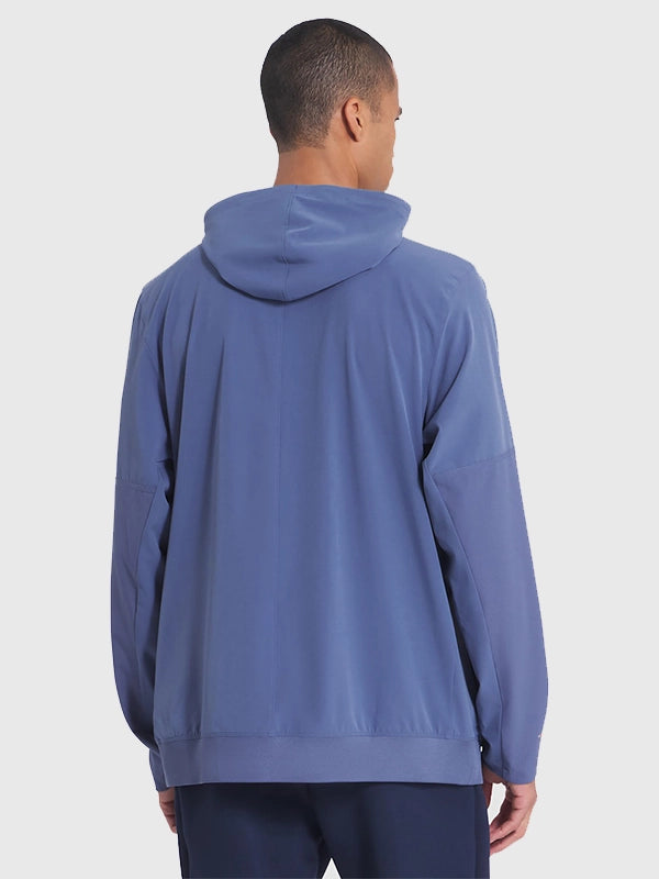 Blue Patriots sideline anorak from the 2025 Rivalries collection featuring a Nike half-zip build.