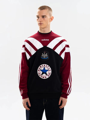 RECREATED Adidas Newcastle United 1995/96 sweatshirt featuring soft fleece fabric and vintage design