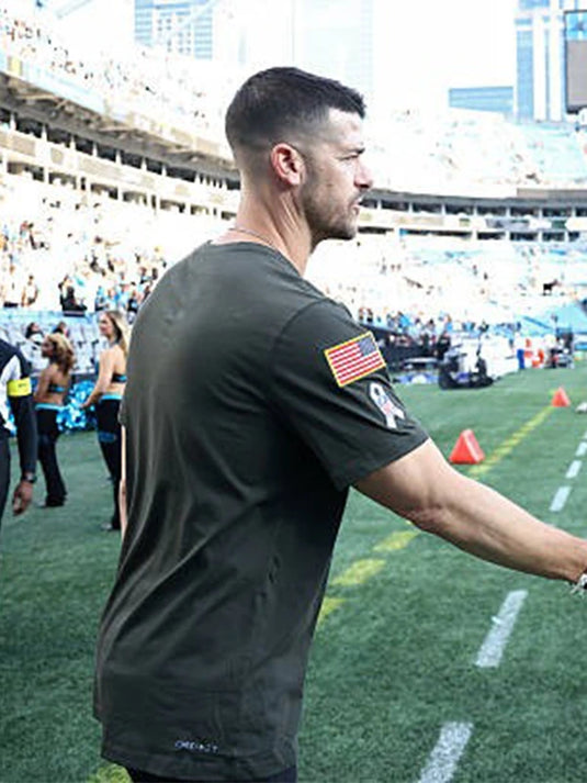 2025 Carolina Panthers Sideline T-shirt in forest green inspired by Coach Dave Canales, made with Nike performance fabric.