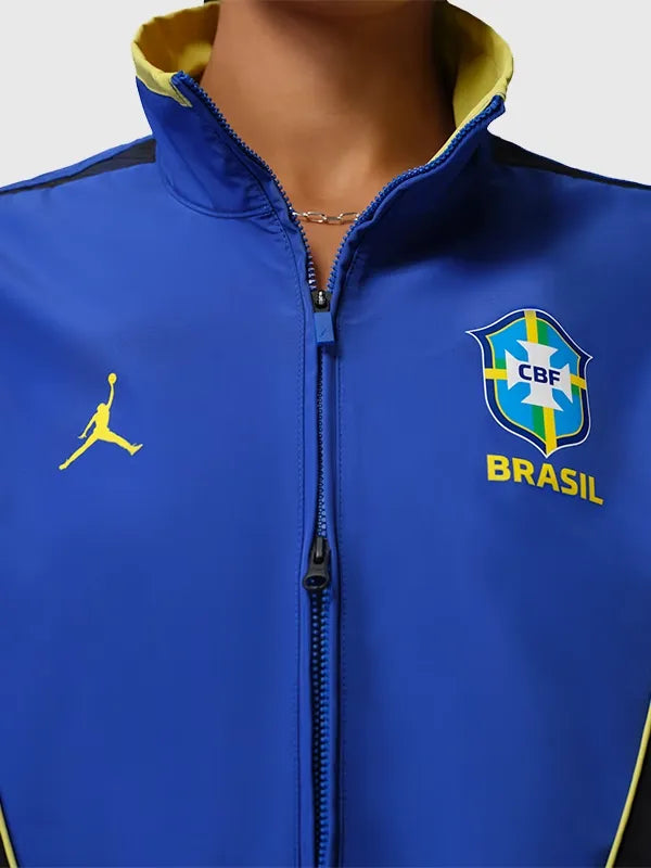 RECREATED Women’s Nike x Jordan Brazil FIFA World Cup 2026 Anthem Track Jacket in Blue and Black showcasing a clean zip-up design with football-inspired detailing
