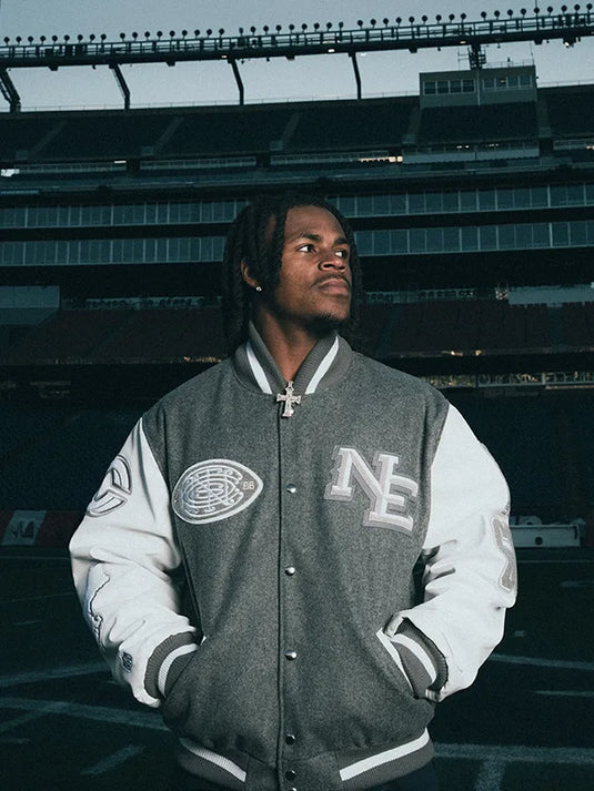 Recreated Patriots 2025 wool varsity jacket showing off collaborative CNCPTS and Nike branding.