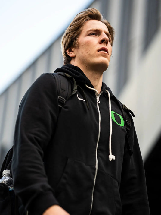 Recreated Nike full-zip black hoodie for the Oregon Ducks with refined team accents.