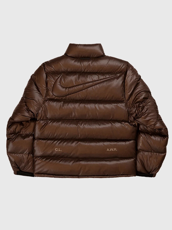 2025 Nocta x Nike Sunset puffer jacket in brown designed with soft down fill and modern streetwear flair.