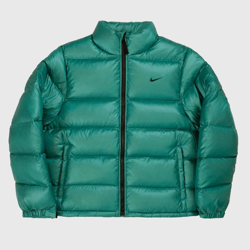 Nocta x Nike 2025 green down jacket with a plush puffer construction and unisex silhouette.