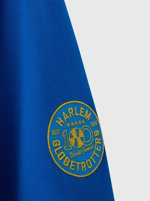 RECREATED OVO Harlem Globetrotters Pullover Hoodie in Blue offering plush fleece comfort with a modern streetwear appeal