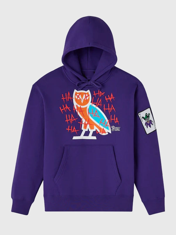 RECREATED October’s Very Own 2026 The Joker Defaced Purple Fleece Pullover Hoodie designed with cozy fleece construction and a striking streetwear silhouette
