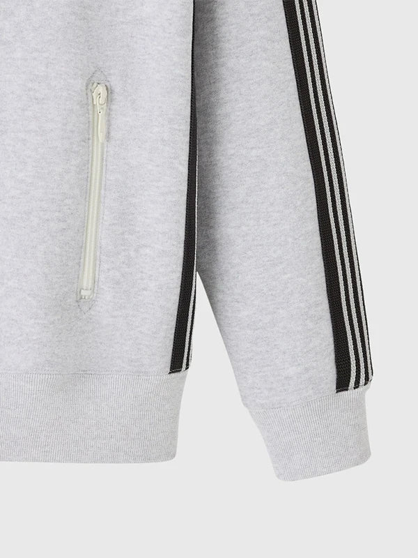 Unisex October’s Very Own x Needles 2026 full zip grey jacket crafted for mobility, comfort, and refined athletic aesthetic