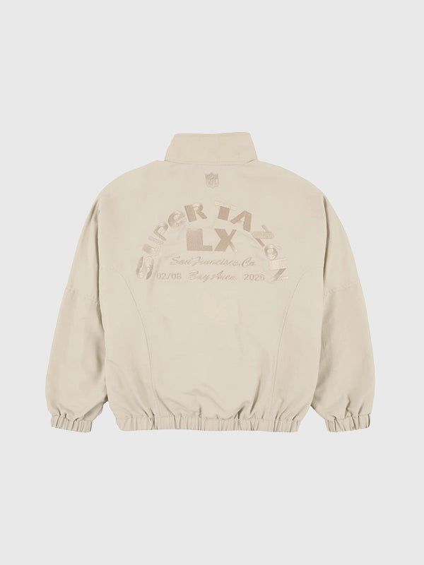 Super Tazón LX Bad Bunny off-white unisex track jacket with full zipper, side pockets, and bold event embroidery