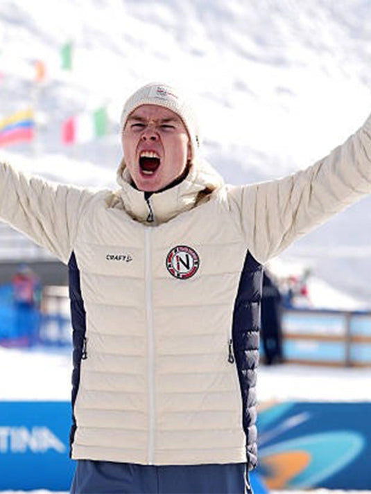 Team Norway Craft light down puffer jacket for Milano Cortina 2026 in off-white featuring lightweight warmth and streamlined fit