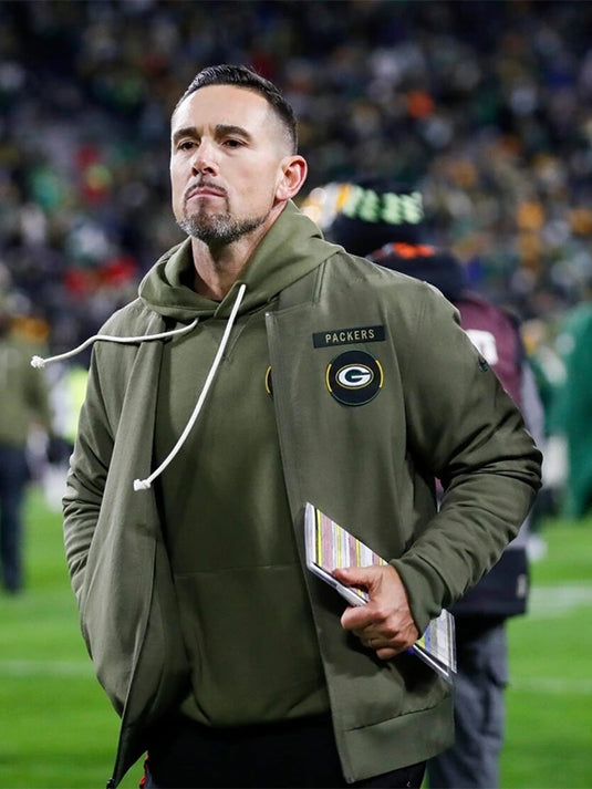 2025 Green Bay Packers Salute to Service cotton bomber jacket in olive green featuring sideline-inspired details.