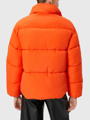 Recreated Zendaya The Drama 2026 Emma Harwood orange puffer jacket with smooth parachute fabric and warm padded construction