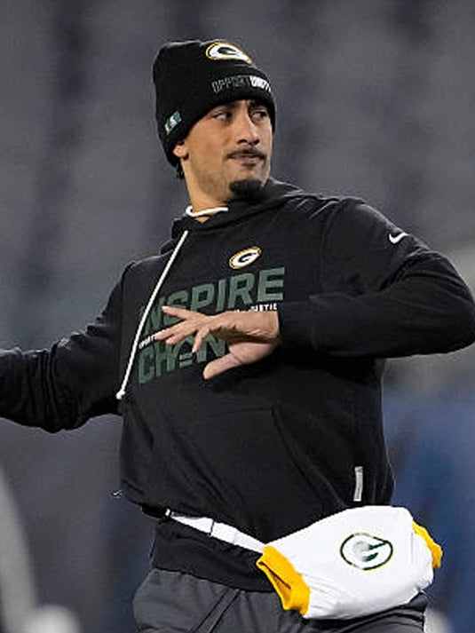 Nike pullover hoodie for Green Bay Packers showcasing Inspire Change messaging in a clean black finish