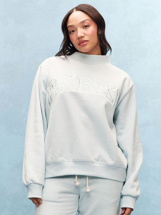 Parke 2026 monochrome fleece sweatshirt showcasing a classic varsity look and cozy mockneck collar