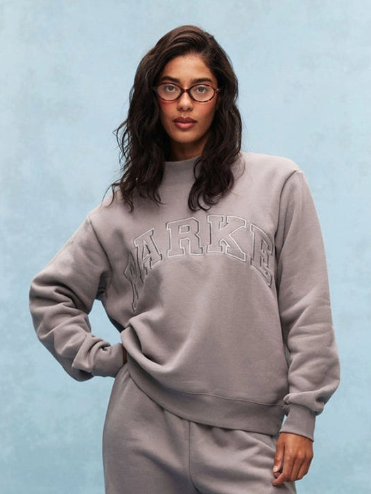 Parke 2026 fleece varsity sweatshirt combining a minimalist monochrome style with a comfortable mockneck