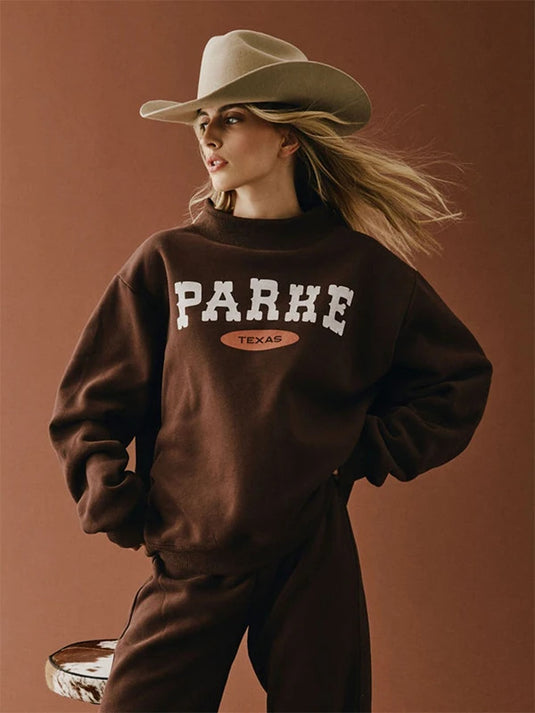 Recreated Parke Texas Signature Mockneck Fleece Sweatshirt in Brown featuring bold chest text and soft fleece fabric.
