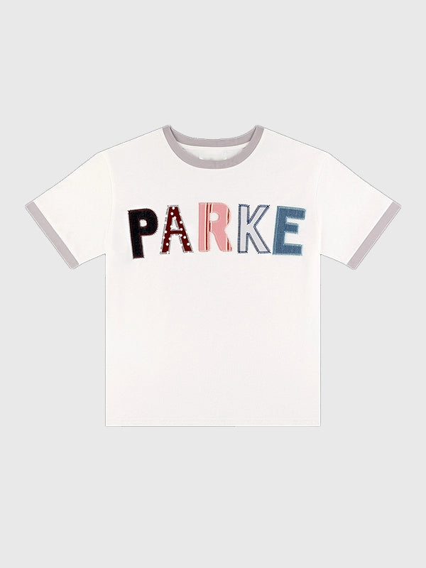 RECREATED Parke Valentine’s 2026 drop patchwork crewneck t-shirt in white with subtle texture detailing