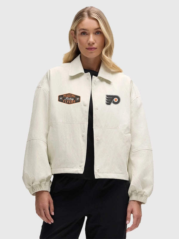 Cream full-button coach’s jacket inspired by the Philadelphia Flyers, recreated for casual and sporty outerwear