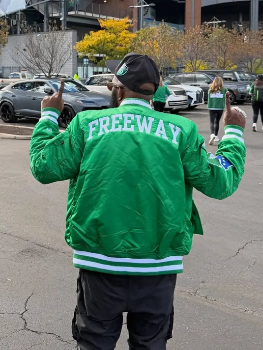 Green bomber jacket featuring Philadelphia Eagles design recreated from Philly Freeway’s original.
