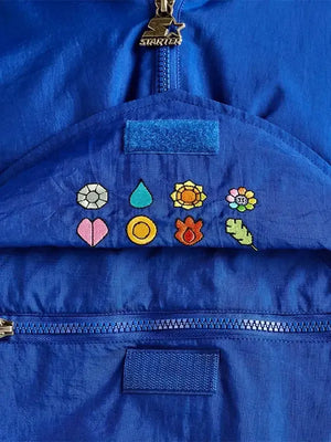 Kanto Starter Pokémon Half-Zip Jacket with pullover construction, color-block detailing, and smooth everyday streetwear finish