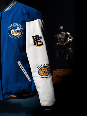 RECREATED Blue & White Parramatta Eels 1986 Premiers Varsity Jacket designed with a structured fit and classic collegiate appeal