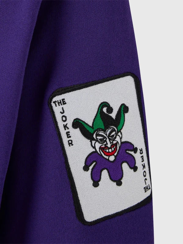 RECREATED October’s Very Own 2026 The Joker Defaced Pullover Fleece Hoodie in Purple showcasing relaxed comfort with a distinctive graphic design