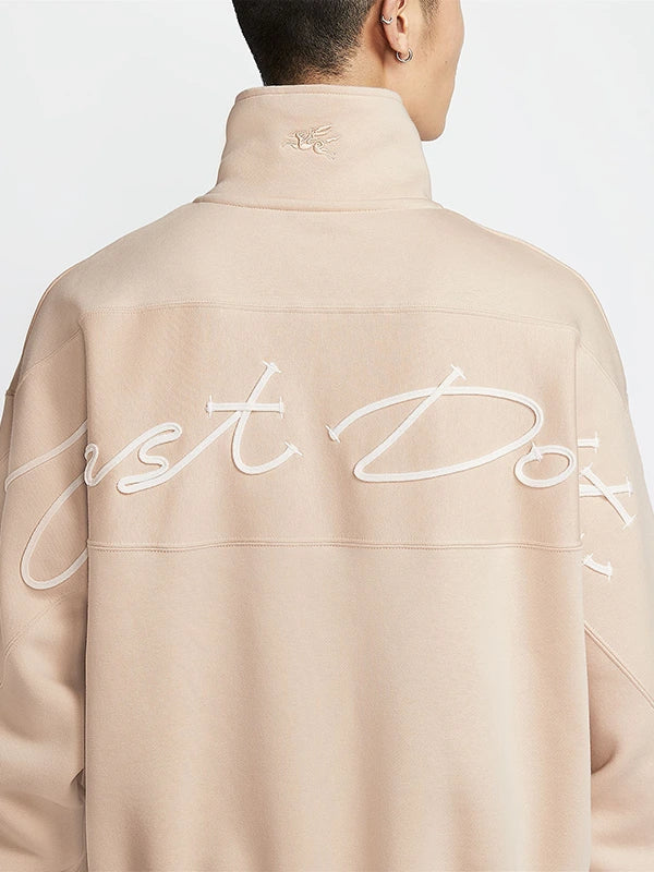 Nike Sportswear China 2026 Year of the Horse limited edition fleece quarter-zip sweatshirt in light beige with soft, cozy fabric