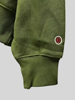 Recreation green pullover hoodie for both men and women reflecting Landon Barker RHU casual fashion aesthetics