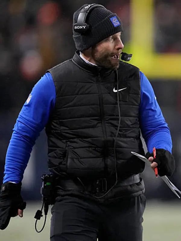 RECREATED Nike Rams playoffs puffer vest in black designed with a streamlined and modern outerwear feel by Nike