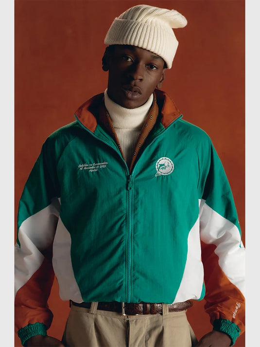 2025 Pompeii x Miami Dolphins Track Jacket featuring a sleek athletic fit and bold collaborative design.