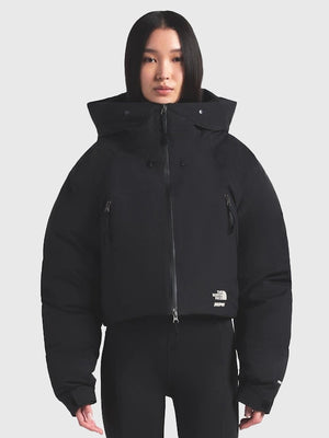 Black and off-white women’s insulated puffer jacket recreated from The North Face x SKIMS 2025 featuring a modern silhouette