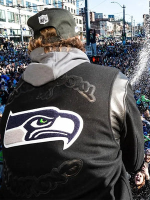 Black wool varsity jacket inspired by the Seattle Seahawks Super Bowl LX parade with team logo and classic varsity style
