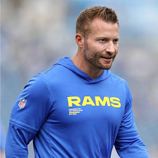 LA Rams performance blue hoodie t-shirt combining Sean McVay’s sideline design with everyday wearability.