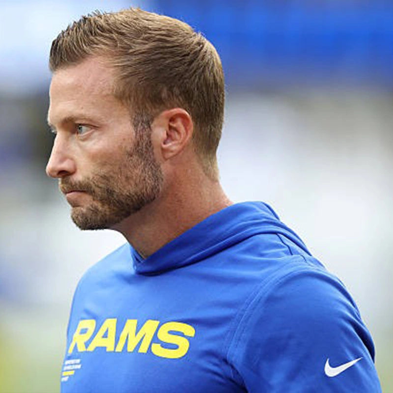LA Rams 2025 blue performance hoodie t-shirt reflecting Coach Sean McVay’s game-day appearance.

