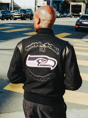 Seattle Seahawks Super Bowl LX champions parade jacket in black wool with embroidered Seahawks emblem and celebration lettering