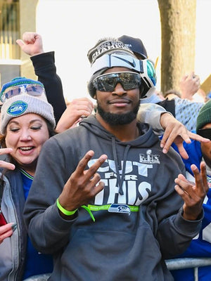 Recreated Seattle Seahawks Super Bowl LX Champions Pickoff Move Parade Club grey pullover fleece hoodie with bold printed team and championship graphics
