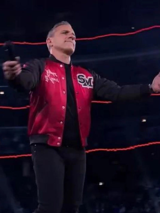 Sebastian Maniscalco It Ain’t Right red and black jacket with a bold, modern contrast design.