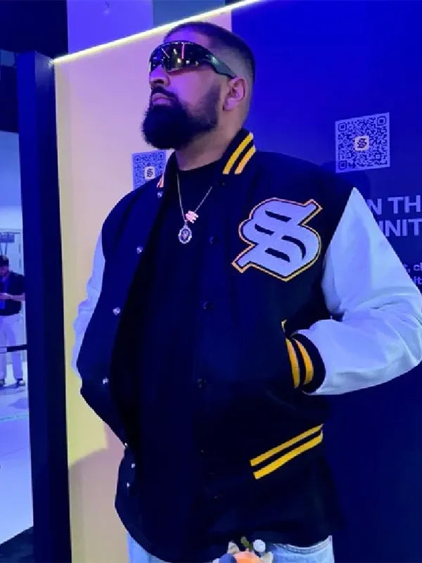 Recreated Solflare black and white wool varsity jacket with contrast sleeves and classic collegiate styling