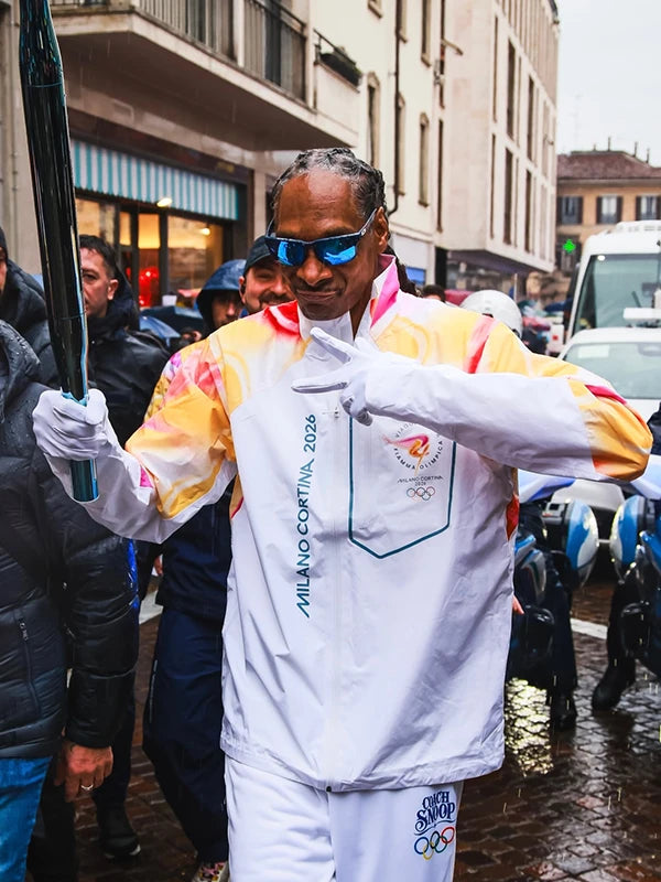 White full-zip jacket recreated from the Milano Cortina 2026 Winter Olympics collection, inspired by Snoop Dogg as torchbearer, featuring lightweight insulation.