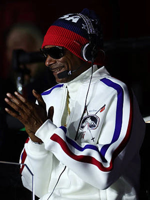 Team USA white track jacket Milano Cortina 2026 design associated with Snoop Dogg, streamlined fit and classic performance styling