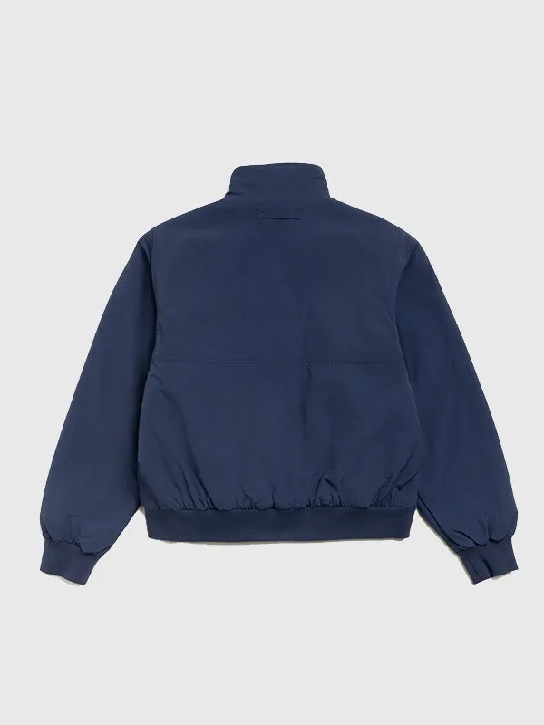 Navy blue Stussy 2026 unisex jacket featuring warm polar fleece lining and durable outer shell construction