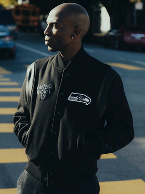 Black wool varsity jacket inspired by Seattle Seahawks 2026 Super Bowl LX champions with contrasting trim and parade celebration design