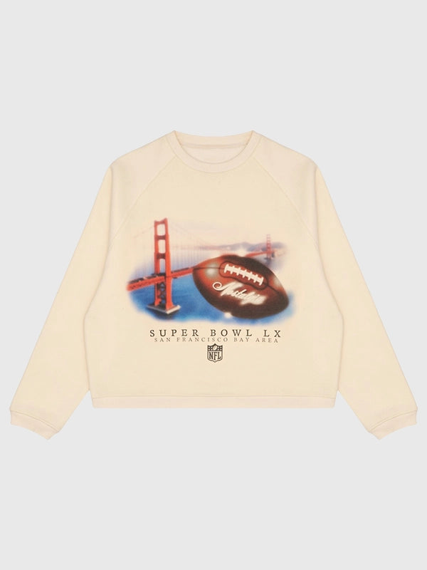 Cream Origins raglan airbrush fleece sweatshirt celebrating Super Bowl LX with relaxed unisex fit and retro-inspired art