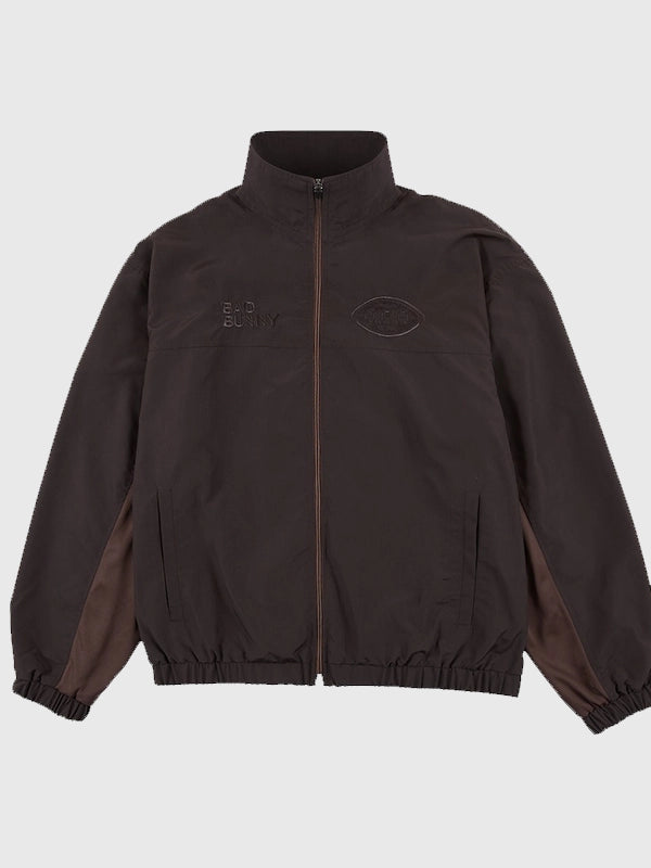 Super Tazón LX Bad Bunny brown unisex track jacket with full zipper and Spanish-inspired logo prints celebrating the 2026 halftime show