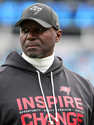 Nike black Inspire Change 2025 hoodie for the Tampa Bay Buccaneers with Opportunity Equity Freedom Justice messaging